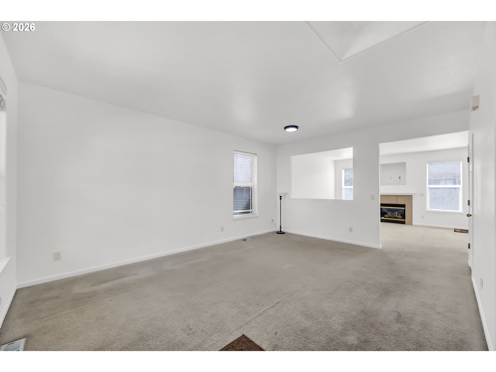 3906 Century Drive Eugene, OR 97402 - Photo 5 of 33 a view of an empty room with a fireplace