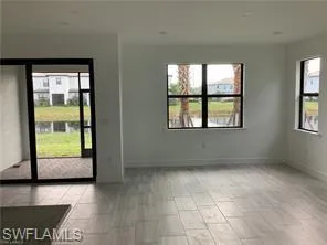 an empty room with windows
