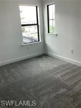 a view of a room with a large window