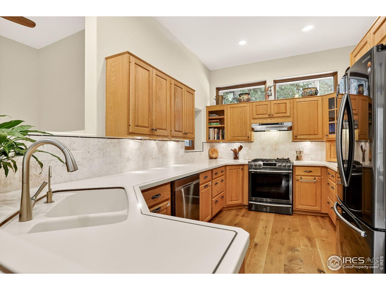 175 Main Street Jamestown, CO 80455 - Photo 12 of 44 a kitchen with stainless steel appliances a stove cabinets and a sink