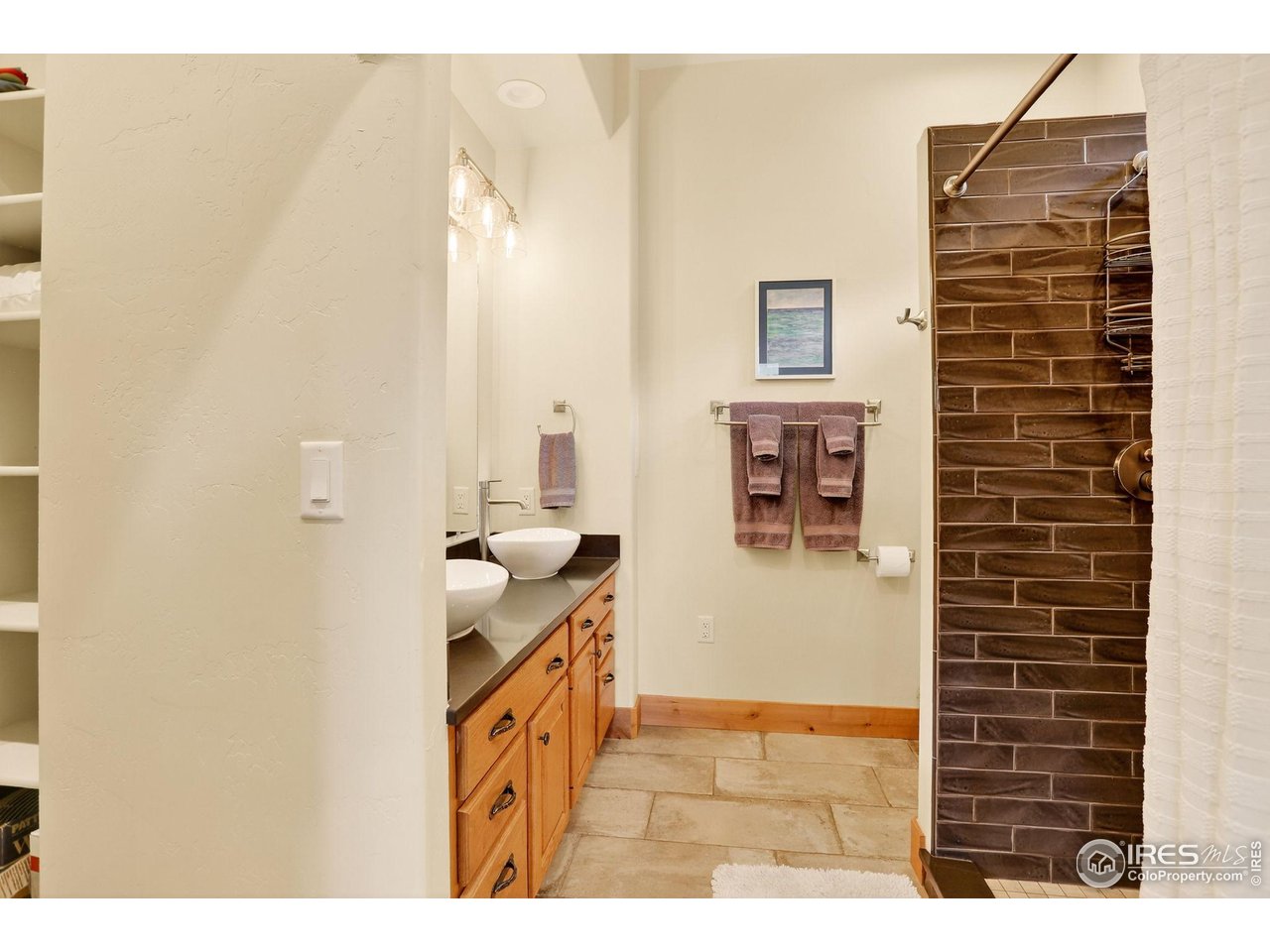 175 Main Street Jamestown, CO 80455 - Photo 19 of 44 a bathroom with a sink and a mirror