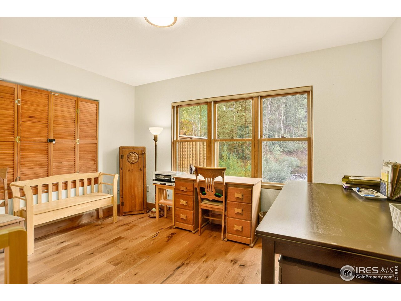 175 Main Street Jamestown, CO 80455 - Photo 23 of 44 a view of a workspace with furniture and a window