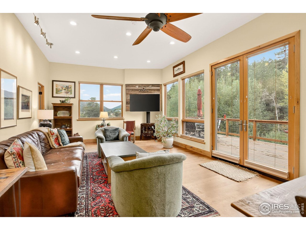 175 Main Street Jamestown, CO 80455 - Photo 5 of 44 a living room with furniture and a large window