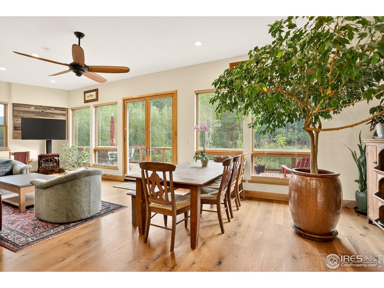 175 Main Street Jamestown, CO 80455 - Photo 9 of 44 a view of a dining room with furniture window and outside view