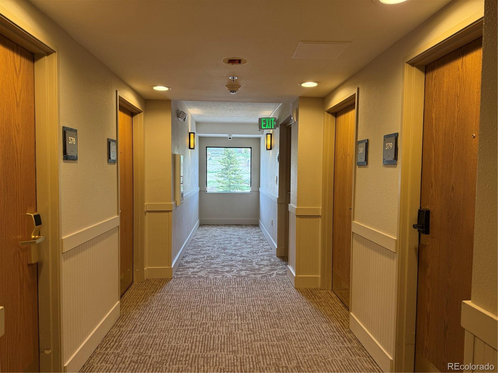 6 Emmons Road, Unit 379/381 Crested Butte, CO 81225 - Photo 18 of 34 a view of hallway with livingroom