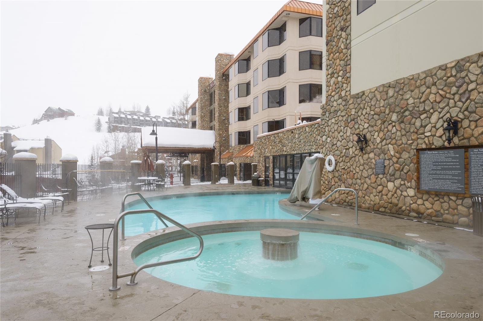 6 Emmons Road, Unit 379/381 Crested Butte, CO 81225 - Photo 27 of 34 a view of a swimming pool with outdoor space