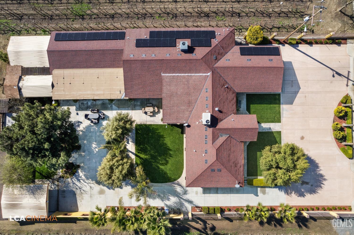 Undisclosed Address Pixley, CA 93256 - Photo 11 of 45 an aerial view of houses with yard