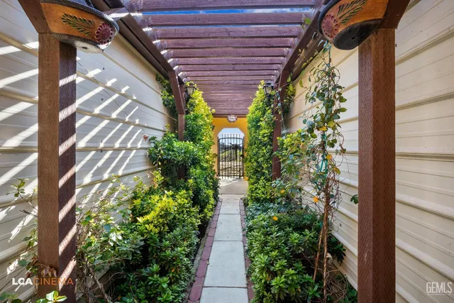 a view of a dining table and chairs in the patio