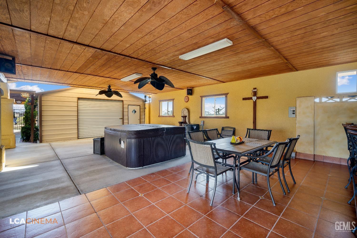 Undisclosed Address Pixley, CA 93256 - Photo 41 of 45 a view of a dining table and chairs in the patio