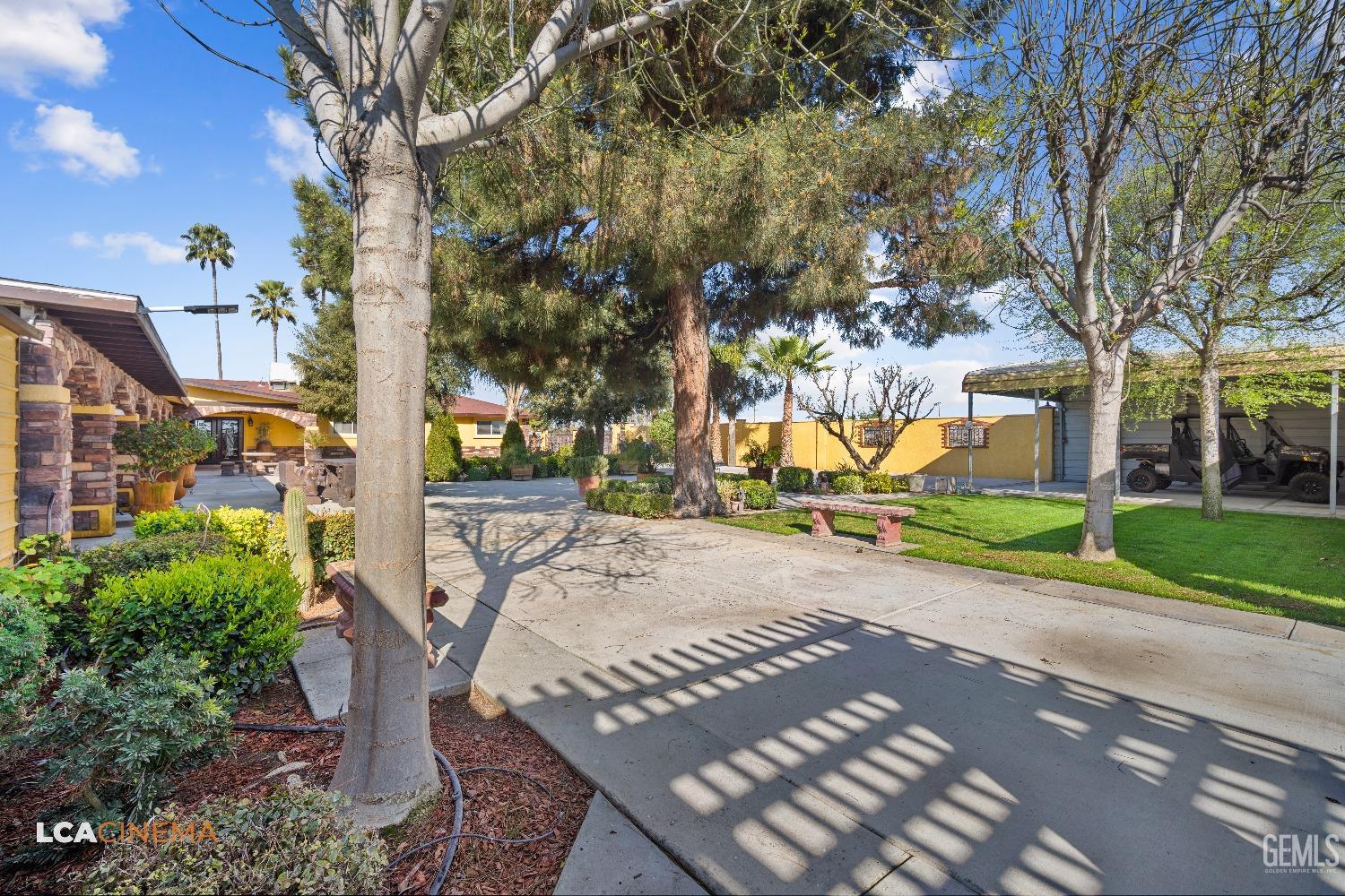 Undisclosed Address Pixley, CA 93256 - Photo 42 of 45 a view of a yard with plants and trees