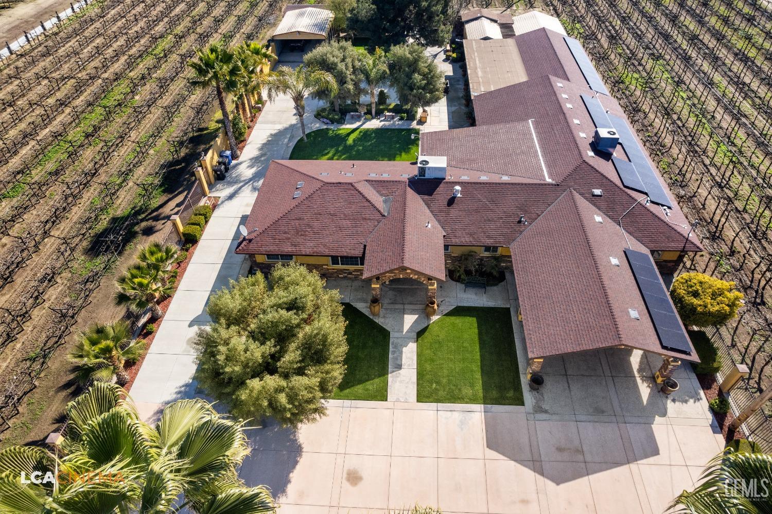 Undisclosed Address Pixley, CA 93256 - Photo 7 of 45 an aerial view of houses with yard
