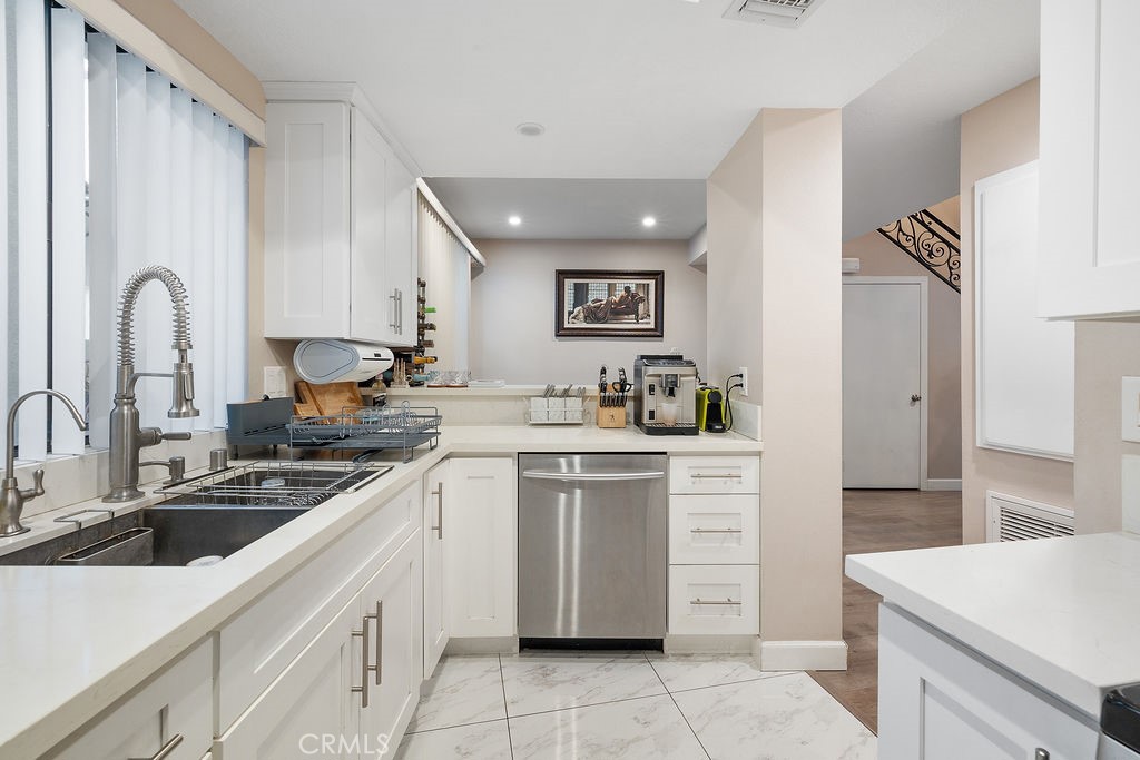 1340 Glenwood Road, Unit 8 Glendale, CA 91201 - Photo 6 of 17 a kitchen with cabinets appliances and a sink