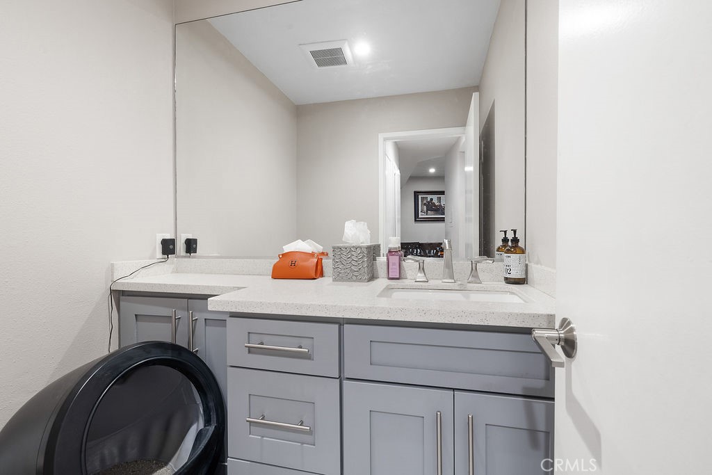 1340 Glenwood Road, Unit 8 Glendale, CA 91201 - Photo 7 of 17 a bathroom with a sink and a mirror