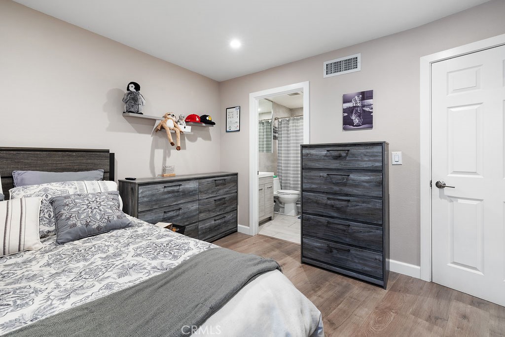 1340 Glenwood Road, Unit 8 Glendale, CA 91201 - Photo 10 of 17 a bedroom with a bed and a dresser