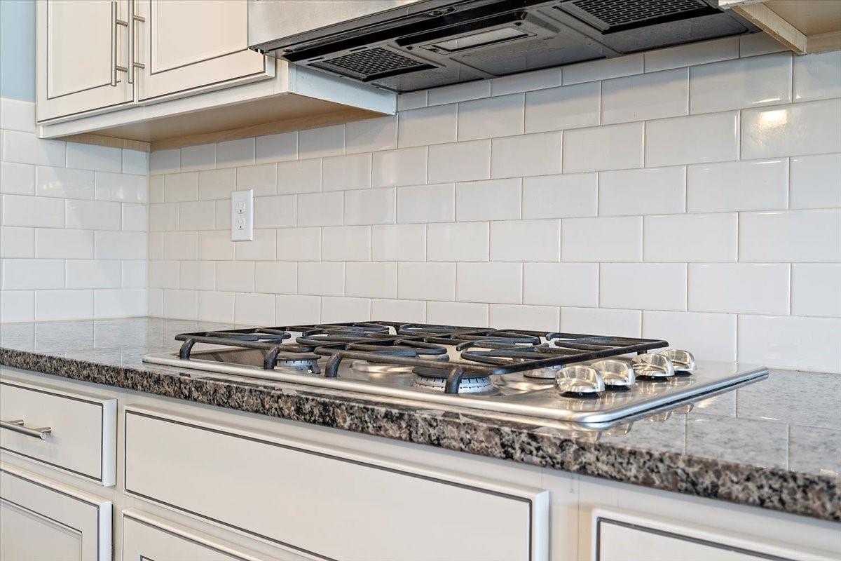 7399 Albemarle Drive Denver, NC 28037 - Photo 11 of 48 a stove top oven sitting inside of a kitchen