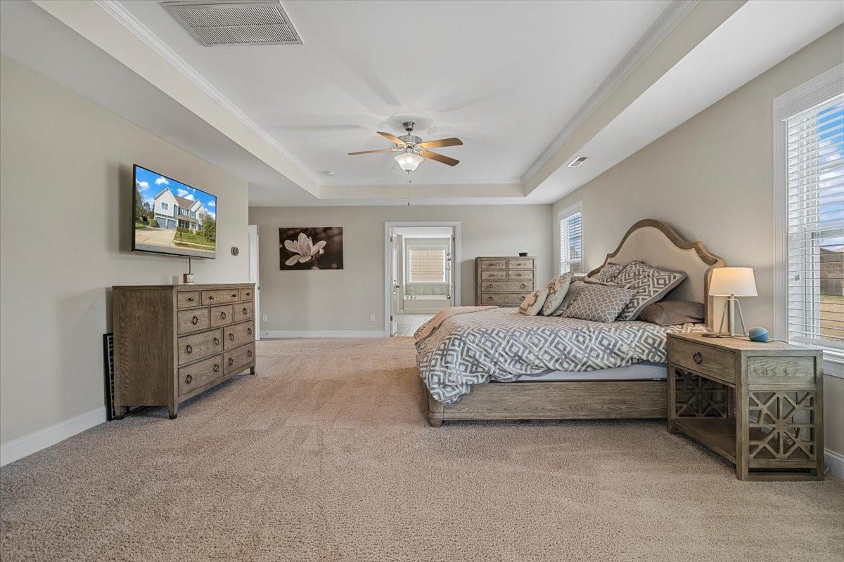 7399 Albemarle Drive Denver, NC 28037 - Photo 27 of 48 a bedroom with a bed dresser and a window