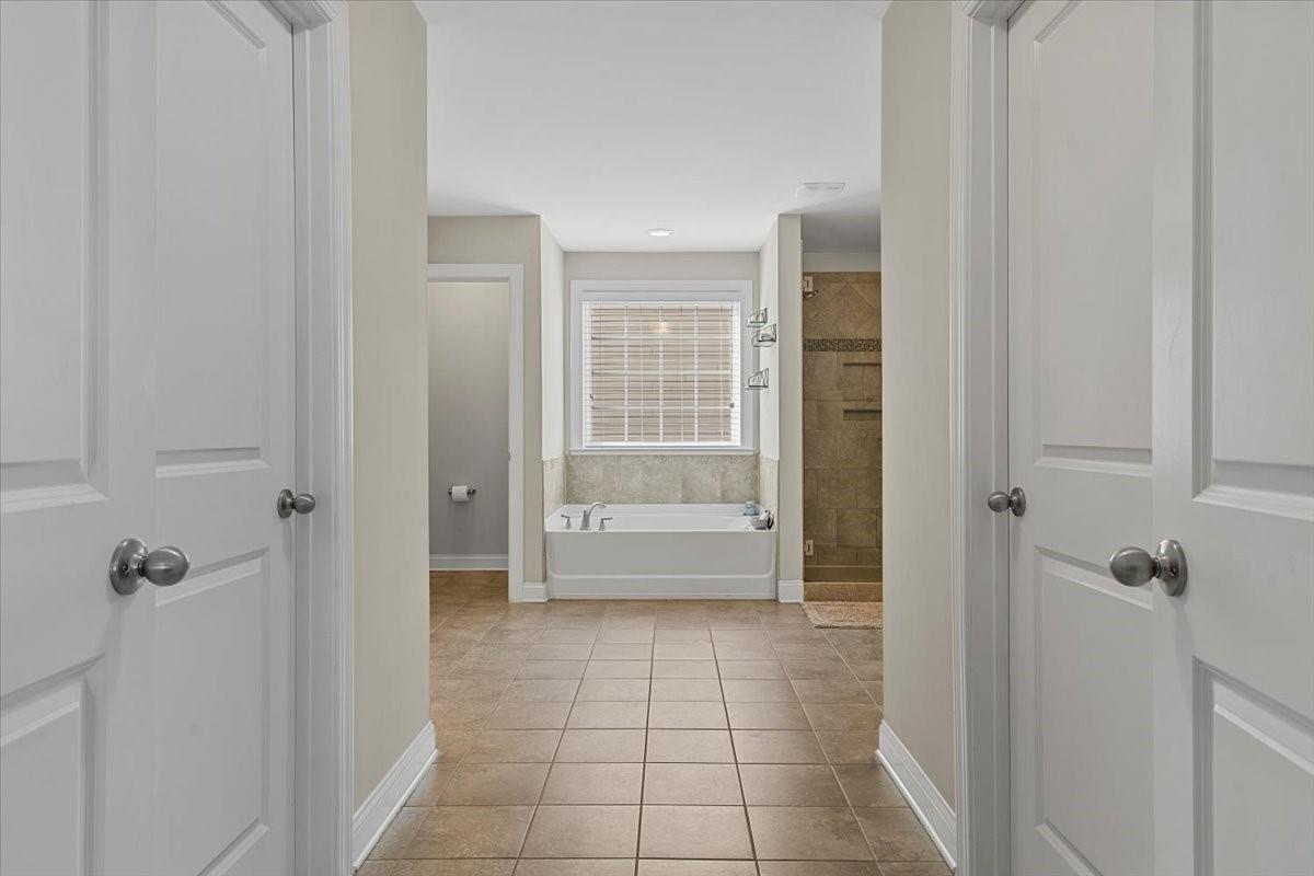 7399 Albemarle Drive Denver, NC 28037 - Photo 28 of 48 a bathroom with a shower