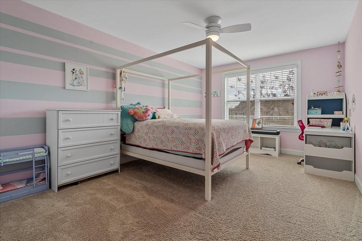 7399 Albemarle Drive Denver, NC 28037 - Photo 36 of 48 a bedroom with a bed and furniture