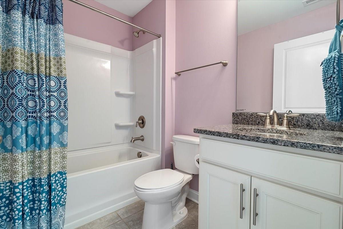 7399 Albemarle Drive Denver, NC 28037 - Photo 37 of 48 a bathroom with a granite countertop bathtub sink vanity mirror and toilet