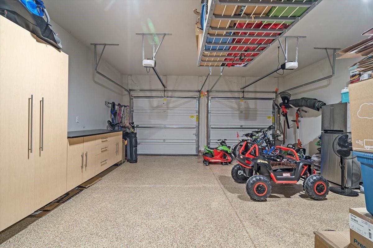 7399 Albemarle Drive Denver, NC 28037 - Photo 38 of 48 a view of a garage with toys