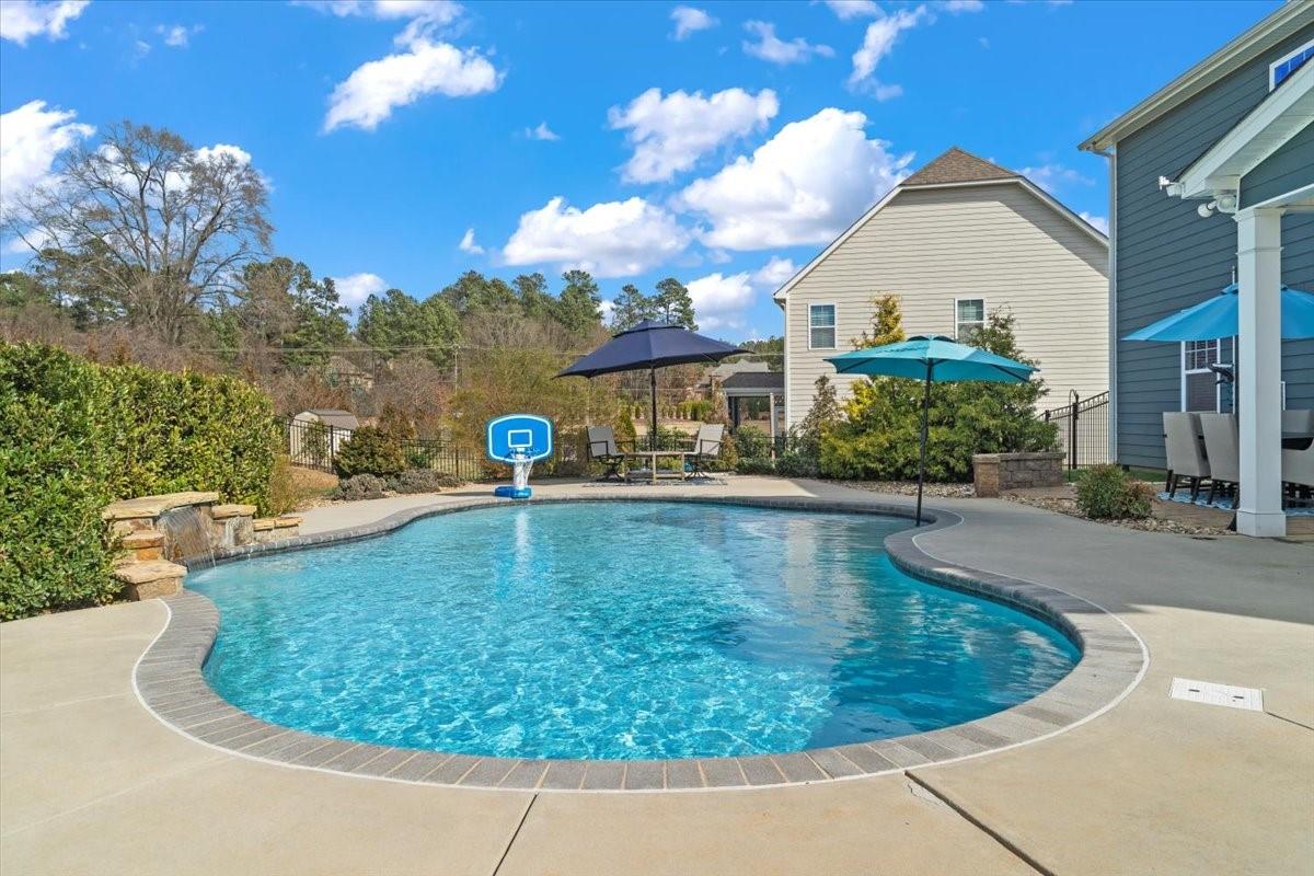 7399 Albemarle Drive Denver, NC 28037 - Photo 43 of 48 a view of a swimming pool with a patio