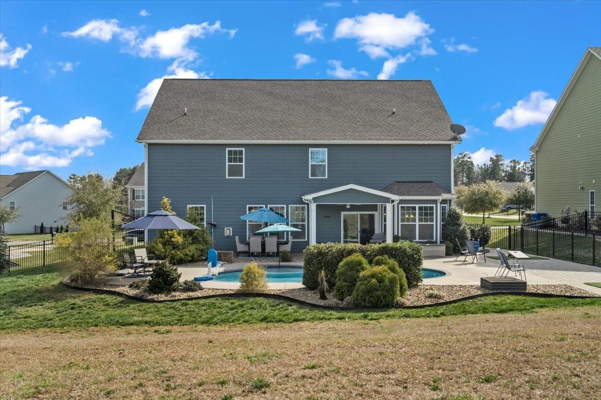 7399 Albemarle Drive Denver, NC 28037 - Photo 47 of 48 a front view of a house with garden