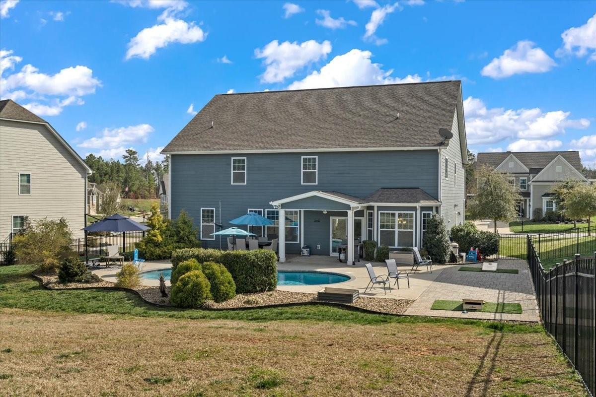 7399 Albemarle Drive Denver, NC 28037 - Photo 48 of 48 front view of a house with a patio