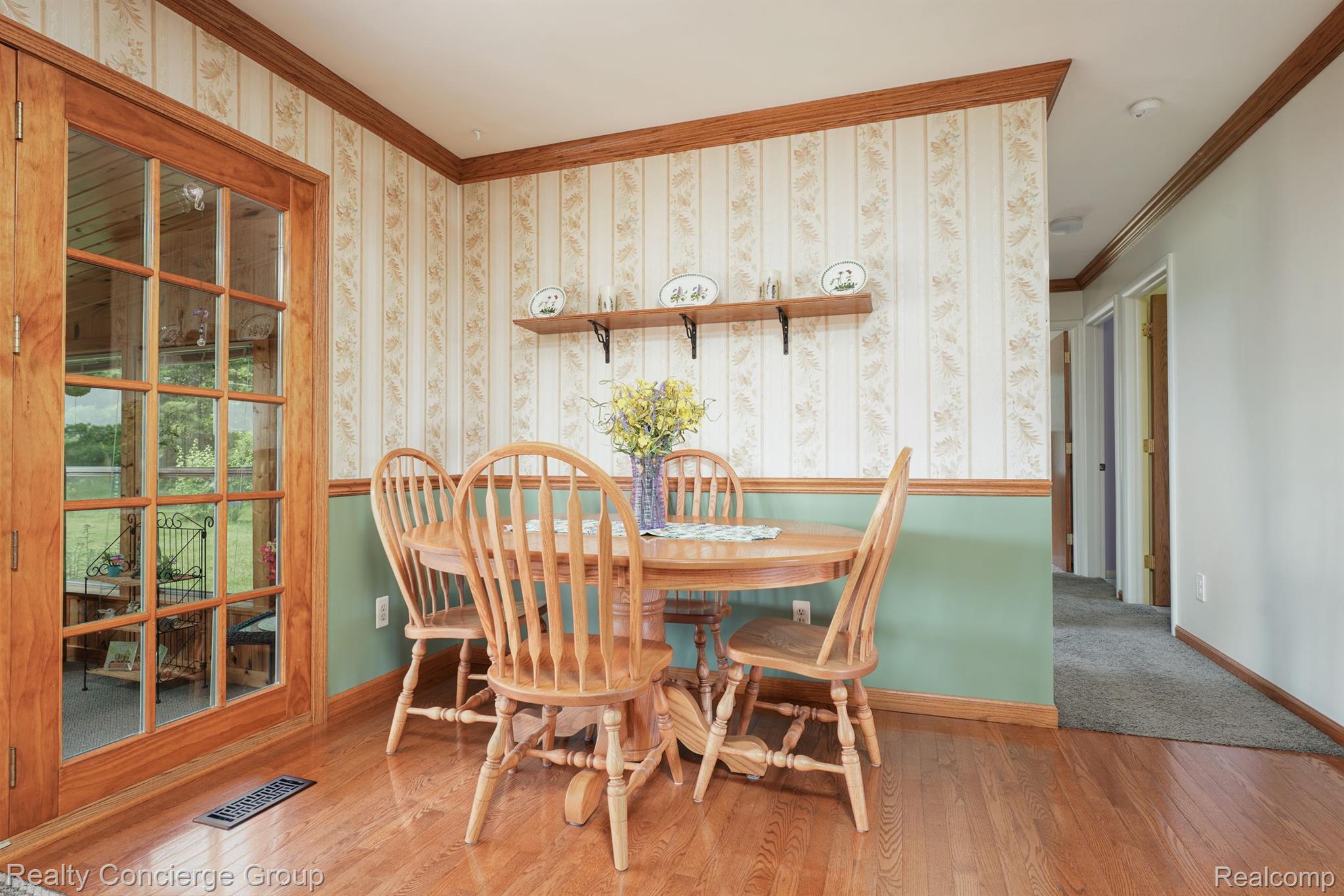Spacious dining area overlooks 3-season room