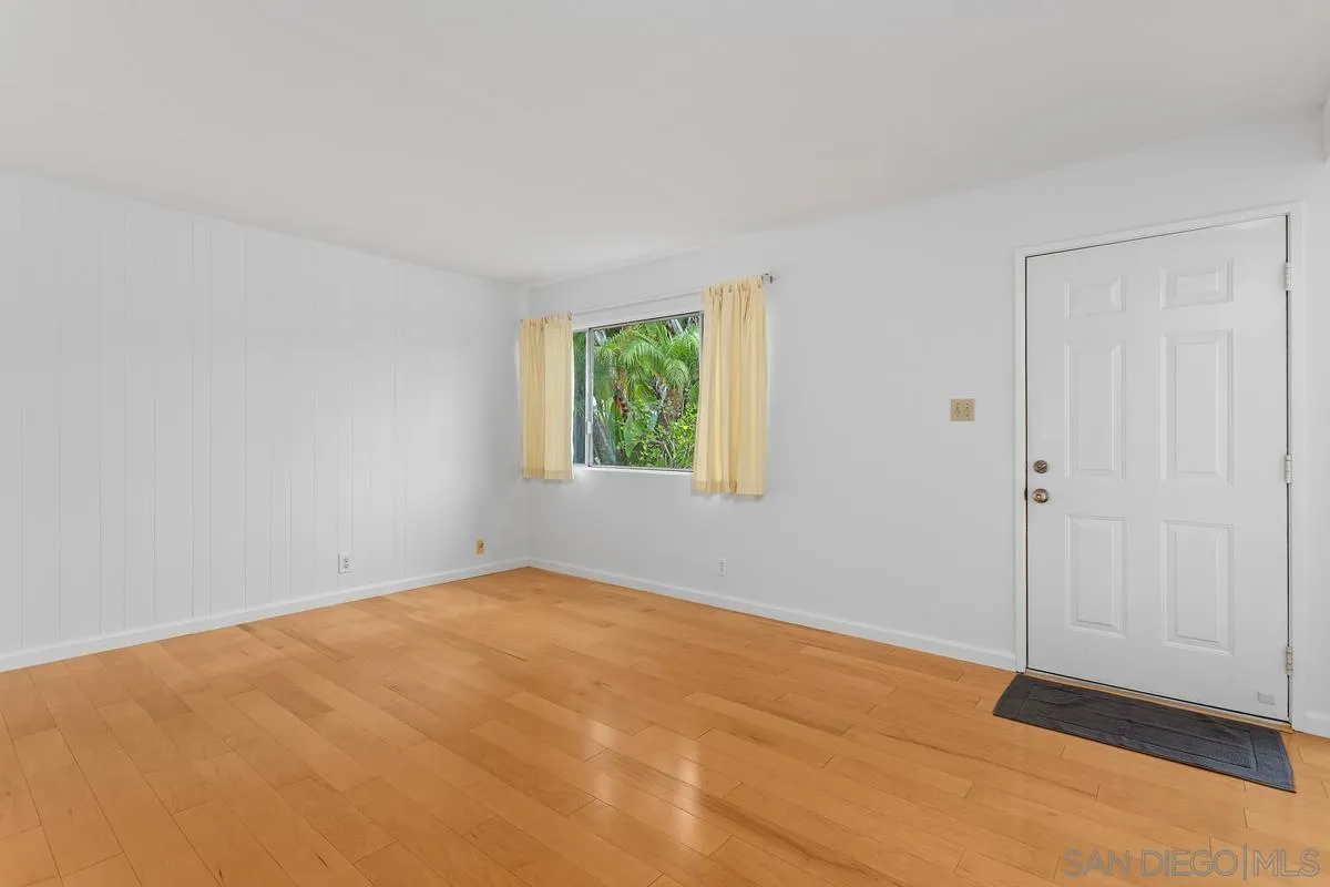 709 Sunflower Street Encinitas, CA 92024 - Photo 11 of 31 a view of an empty room with a window