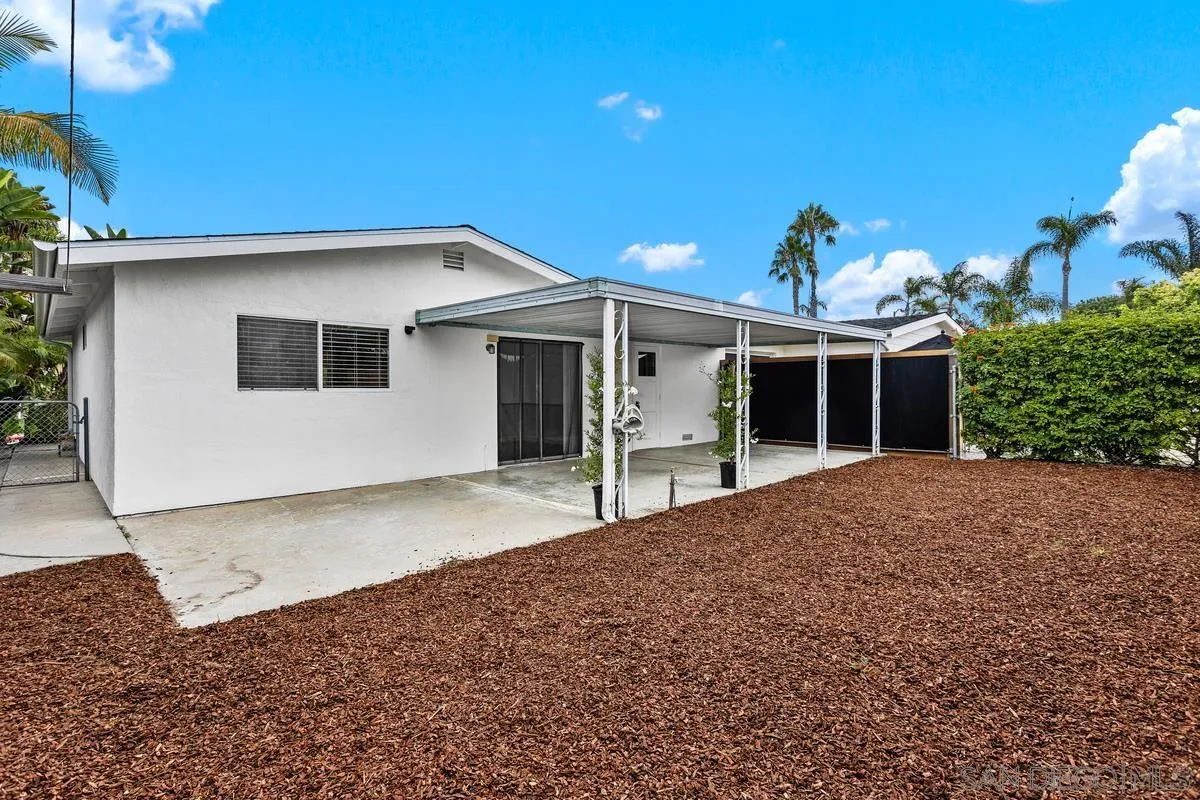 709 Sunflower Street Encinitas, CA 92024 - Photo 30 of 31 a front view of a house with a yard and garage