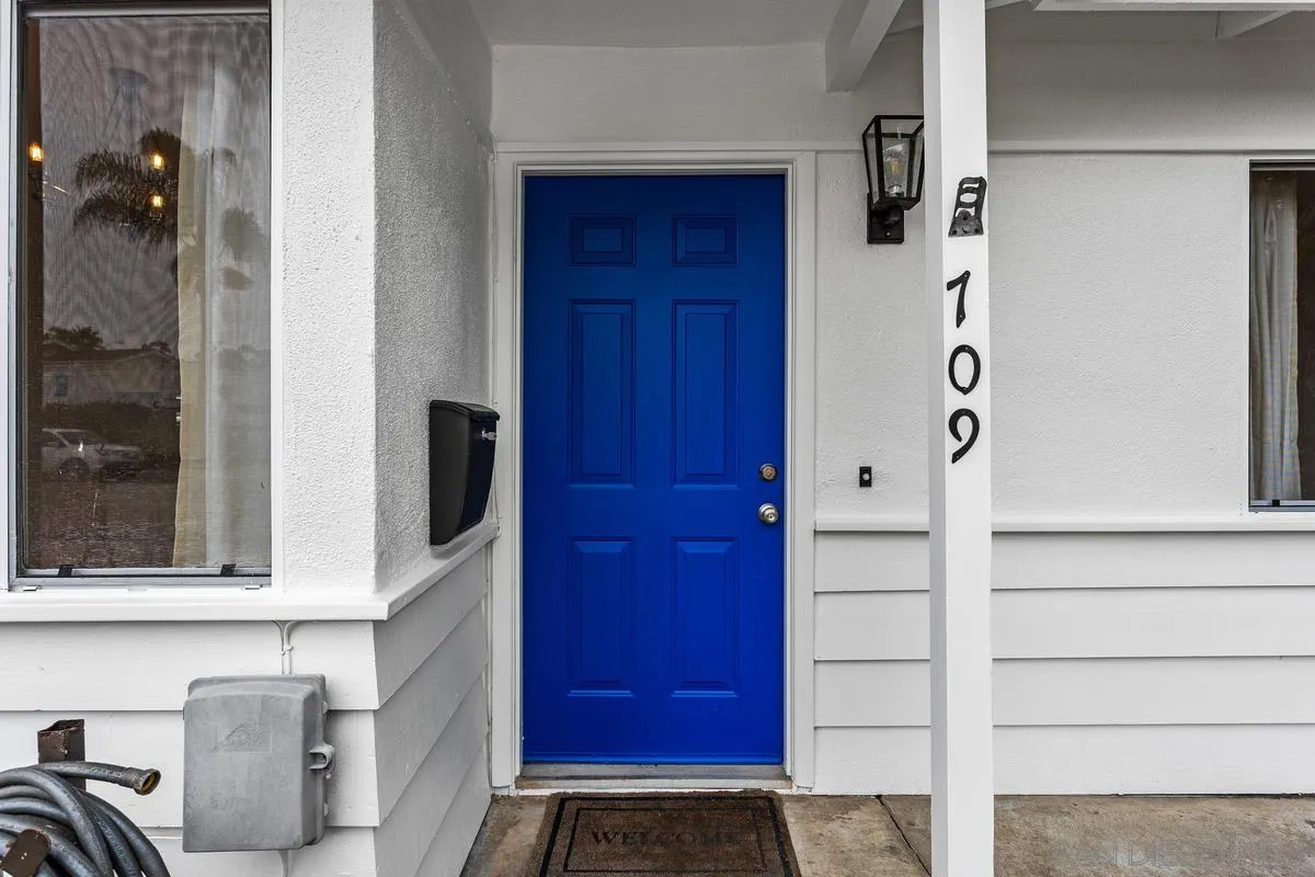 709 Sunflower Street Encinitas, CA 92024 - Photo 5 of 31 a view of front door with wooden door