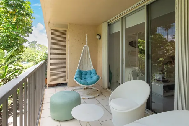 a bathroom with a toilet sink and shower