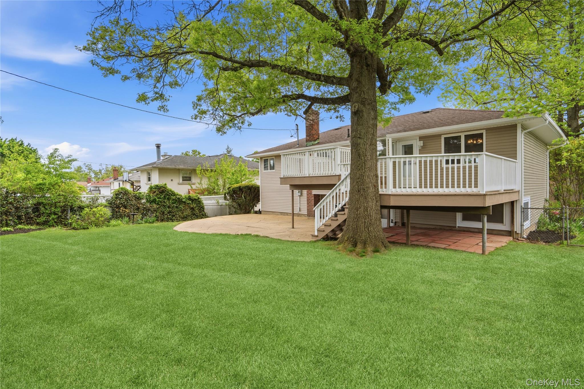 183 North Marginal Road Jericho, NY 11753 - Photo 26 of 28 Backyard with new multi level Deck and Patio