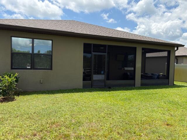 571 Old Country Rd S East Palm Bay, FL 32909 - Photo 24 of 37 a view of a backyard of the house