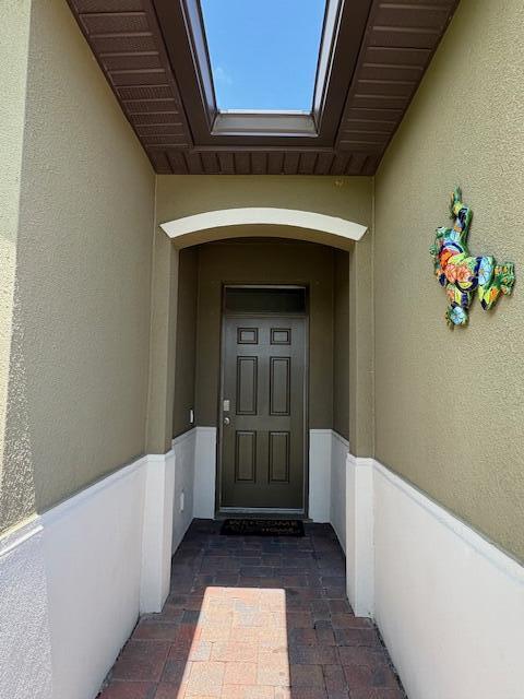 571 Old Country Rd S East Palm Bay, FL 32909 - Photo 3 of 37 a view of an entryway door