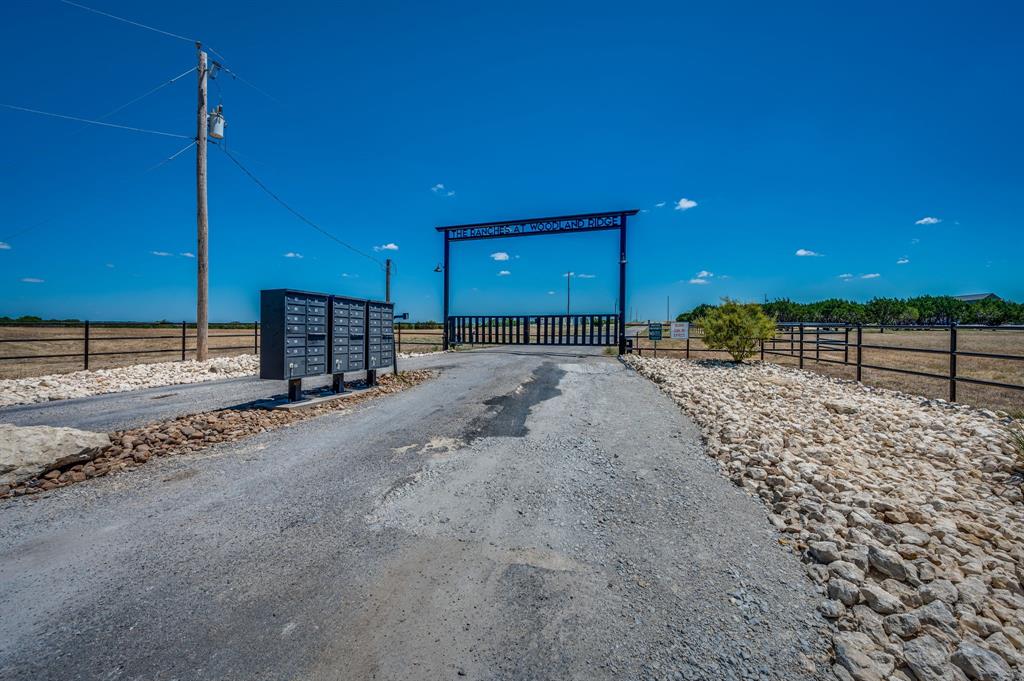 336 Private Road 2658 Walnut Springs, TX 76690 - Photo 11 of 11 a view of a hall with a bench