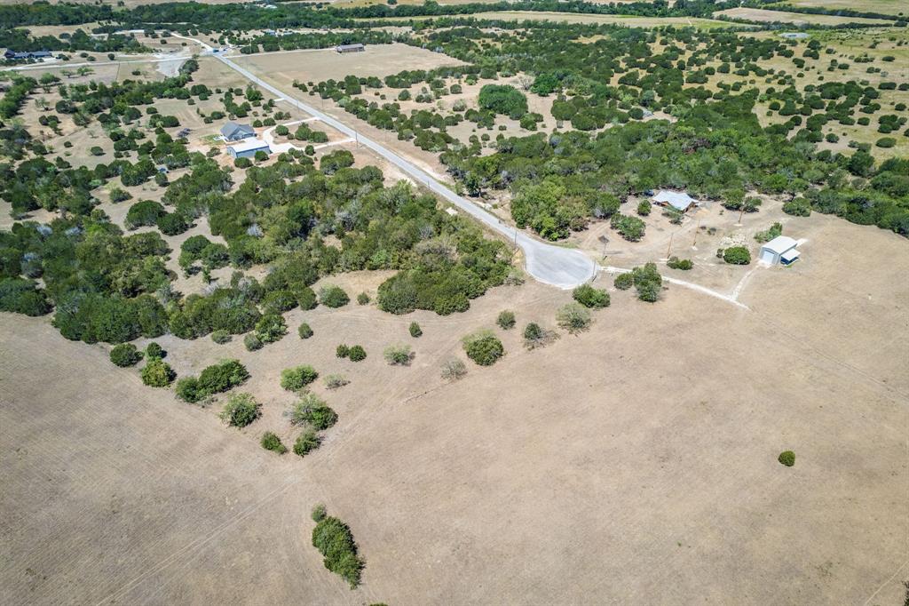336 Private Road 2658 Walnut Springs, TX 76690 - Photo 8 of 11 a view of a dry yard with wooden fence