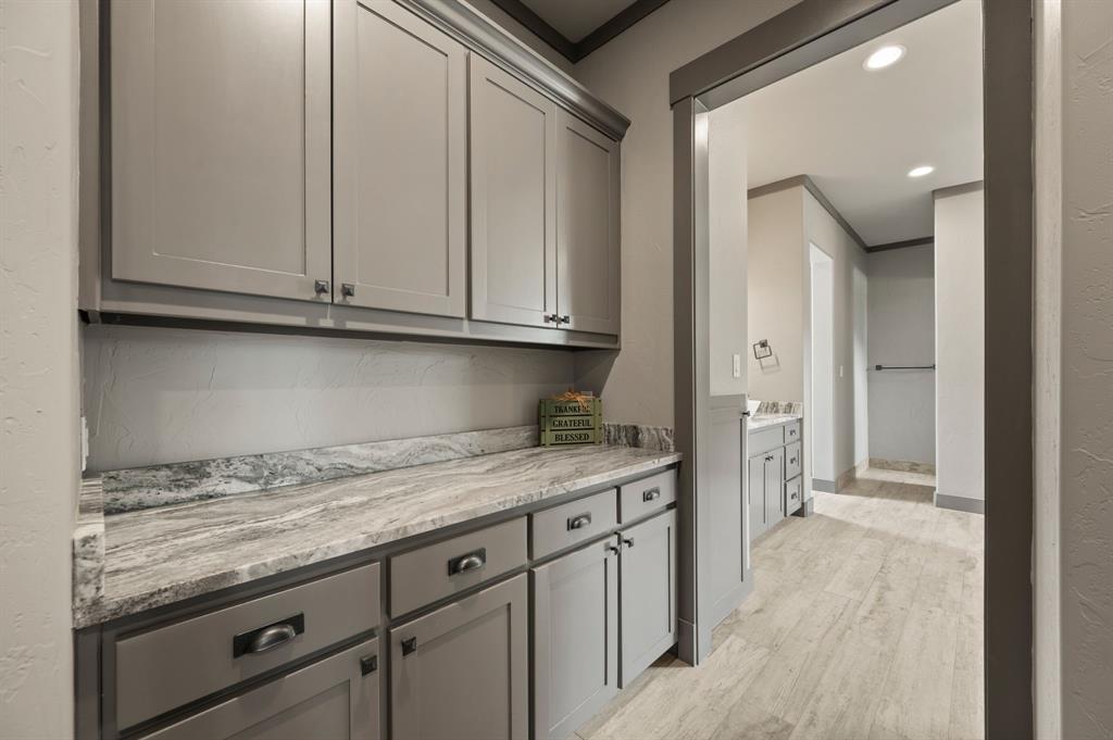 248 Howard Road Valley View, TX 76272 - Photo 13 of 39 a view of a kitchen with granite countertop cabinets