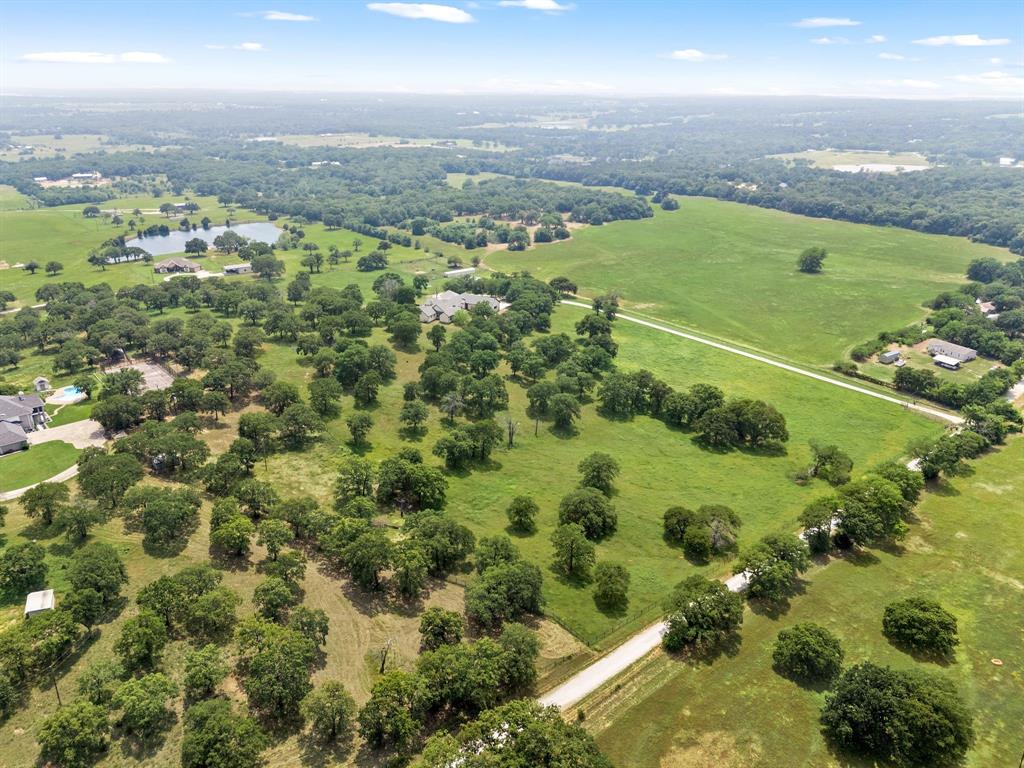248 Howard Road Valley View, TX 76272 - Photo 32 of 39 an aerial view of a houses with yard