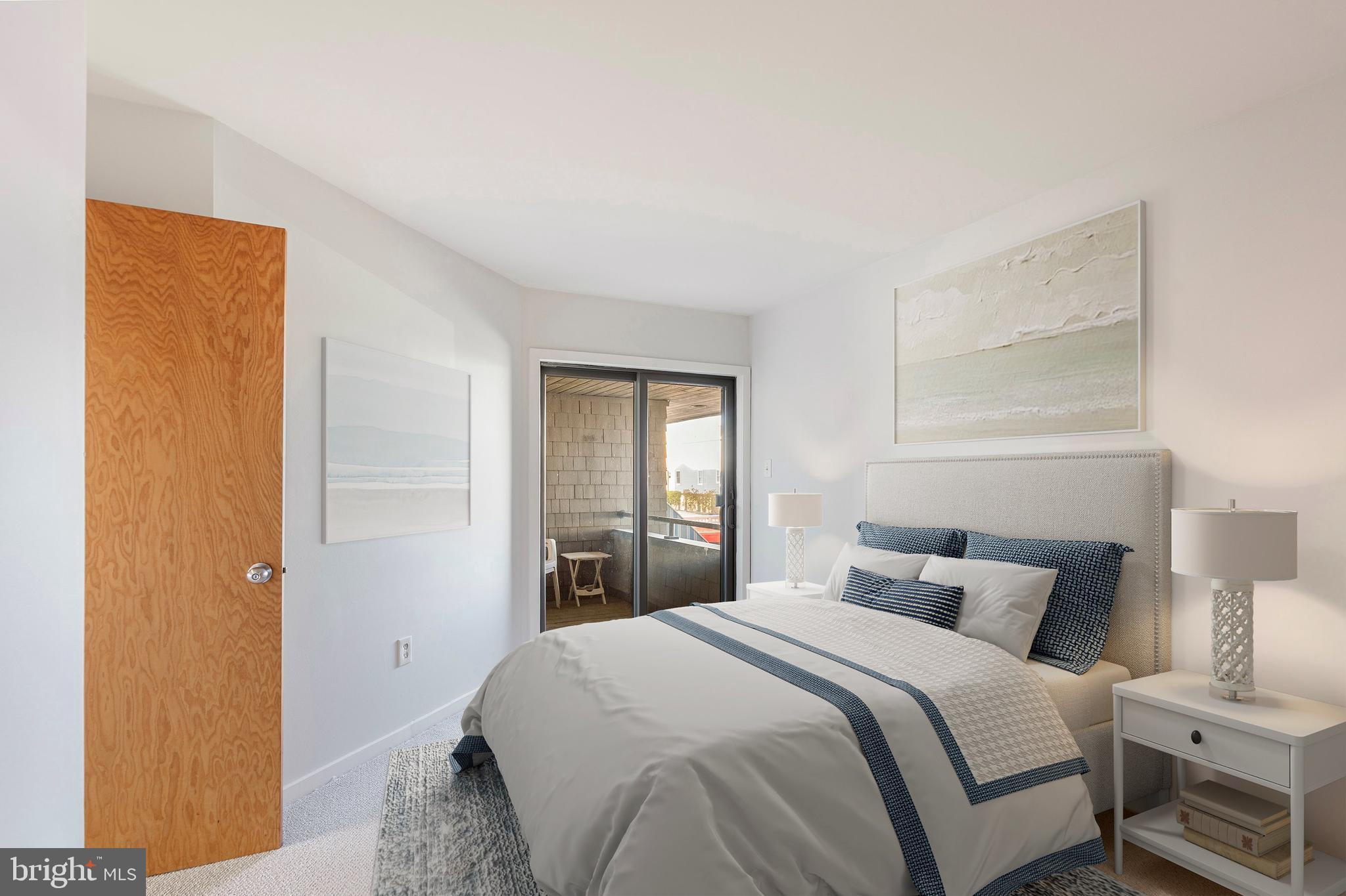 1001 Ocean Avenue, Unit 1017 Ship Bottom, NJ 08008 - Photo 14 of 31 a bedroom with a bed and a window