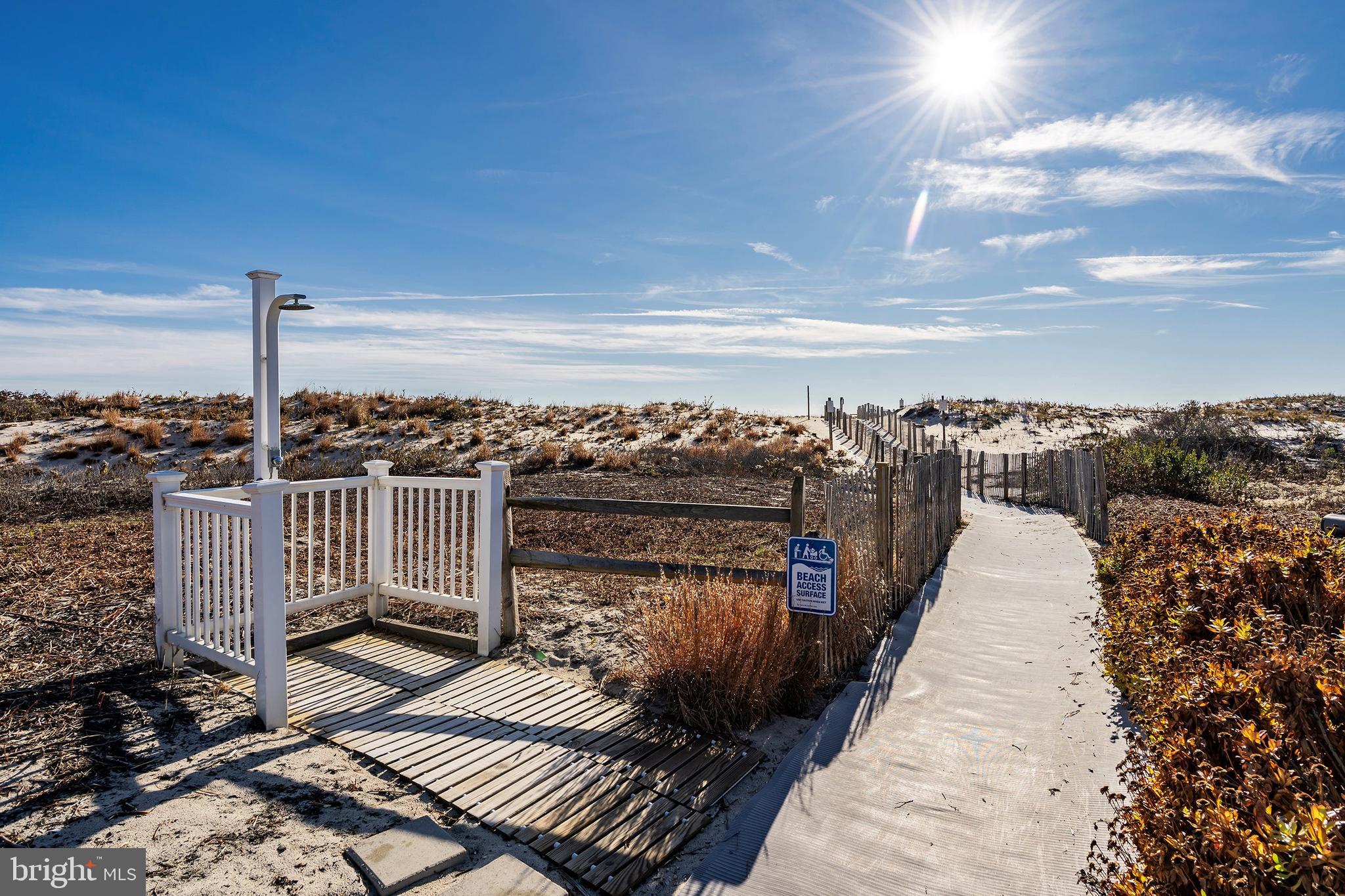 1001 Ocean Avenue, Unit 1017 Ship Bottom, NJ 08008 - Photo 24 of 31 a view of a balcony with wooden floor and city view