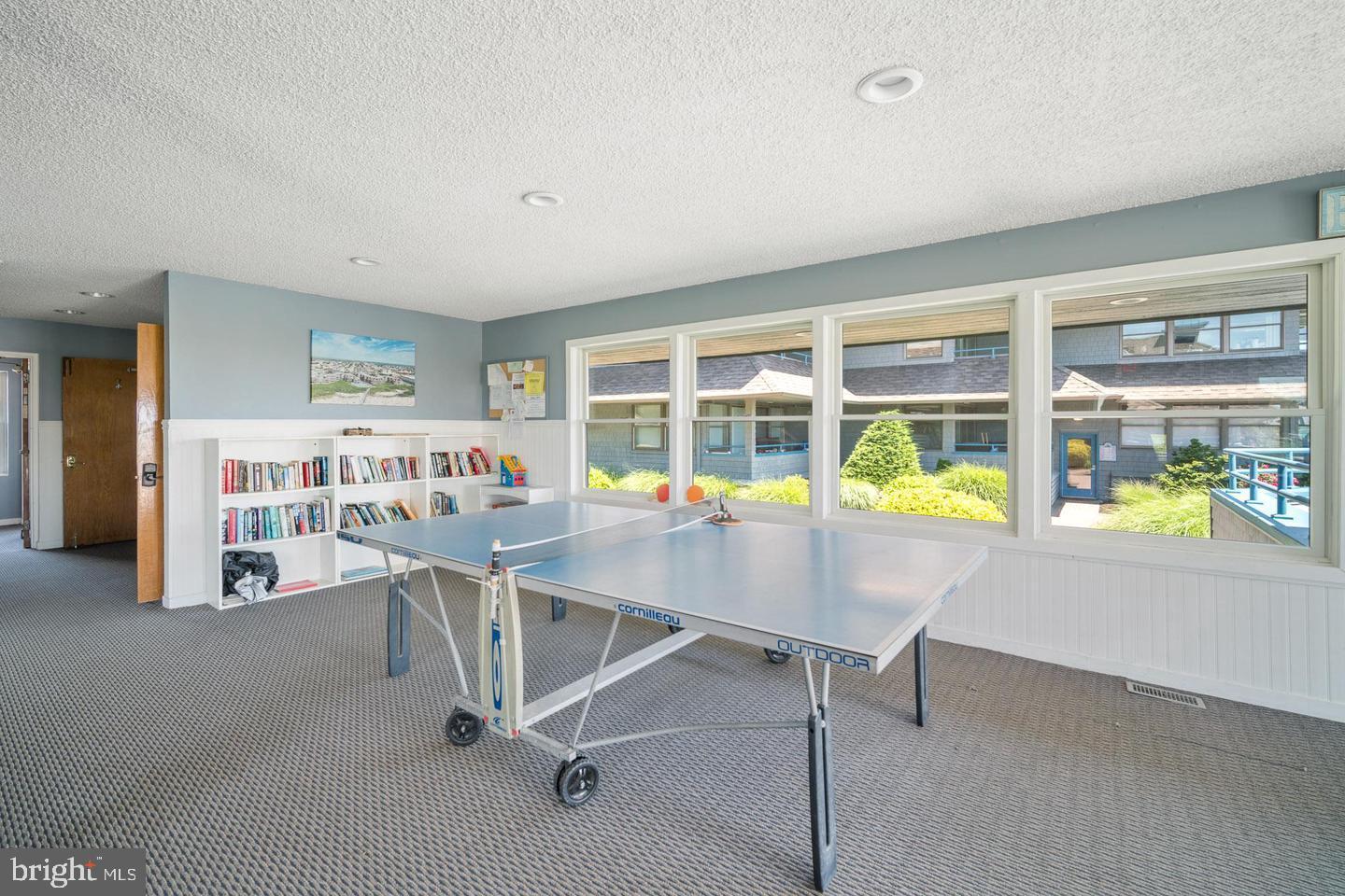 1001 Ocean Avenue, Unit 1017 Ship Bottom, NJ 08008 - Photo 28 of 31 a room with furniture and a window