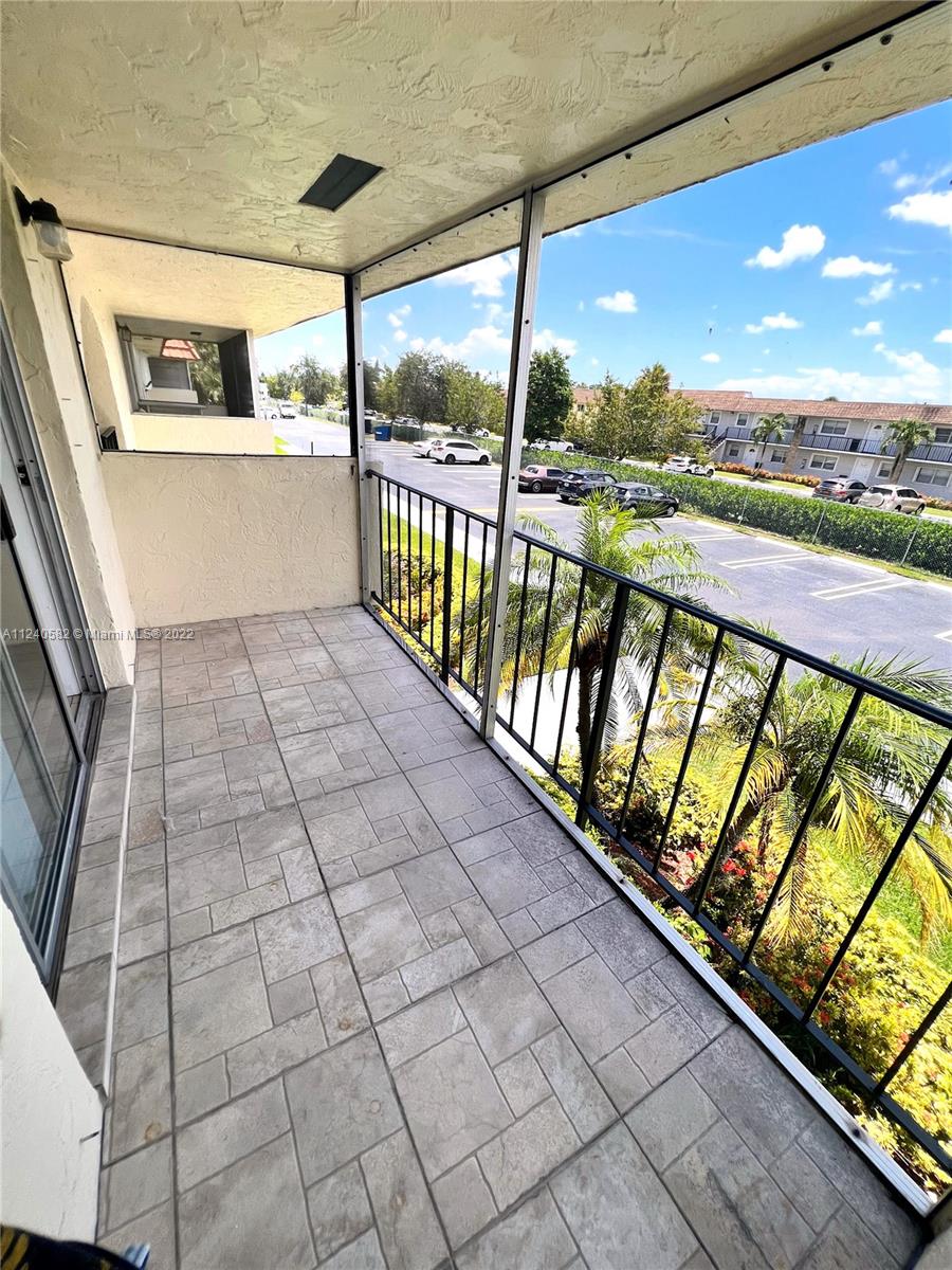 22795 Southwest 66th Avenue, Unit 206 Boca Raton, FL 33428 - Photo 25 of 29 a view of balcony with city view