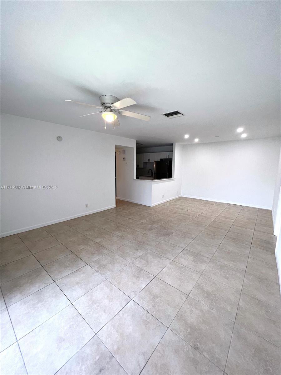 22795 Southwest 66th Avenue, Unit 206 Boca Raton, FL 33428 - Photo 8 of 29 a view of an empty room