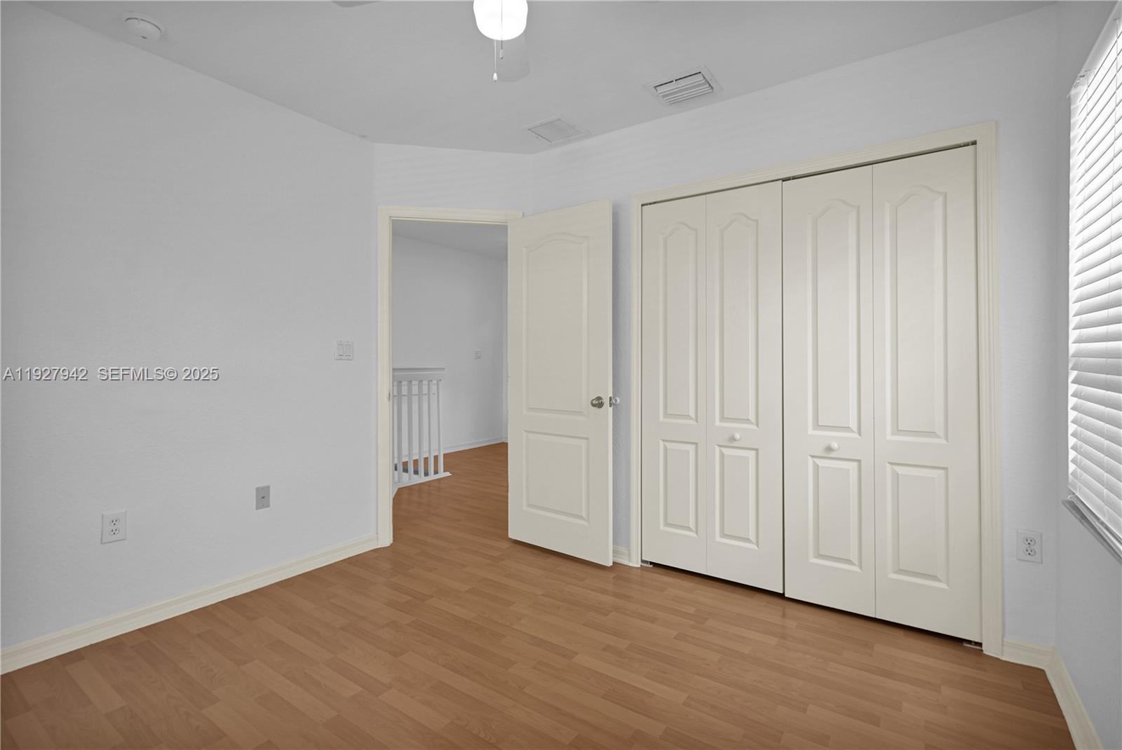 12832 Southwest 30th Street, Unit 118 Miramar, FL 33027 - Photo 19 of 29 an empty room with closet area