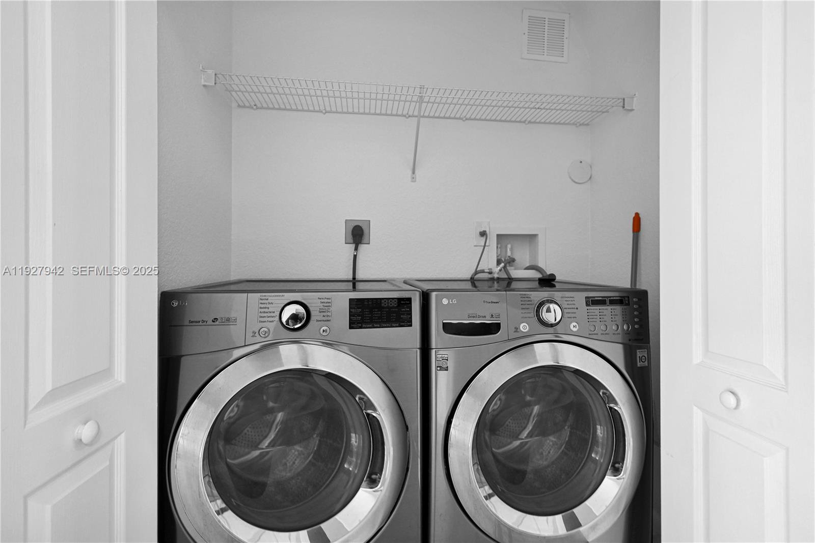 12832 Southwest 30th Street, Unit 118 Miramar, FL 33027 - Photo 25 of 29 a utility room with dryer and washer