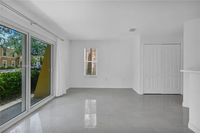 an empty room with windows