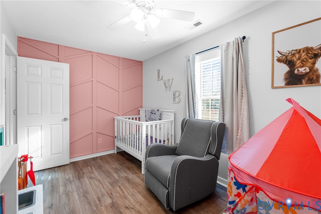 904 Rosebud Run Aylett, VA 23009 - Photo 17 of 20 a living room with furniture and a window