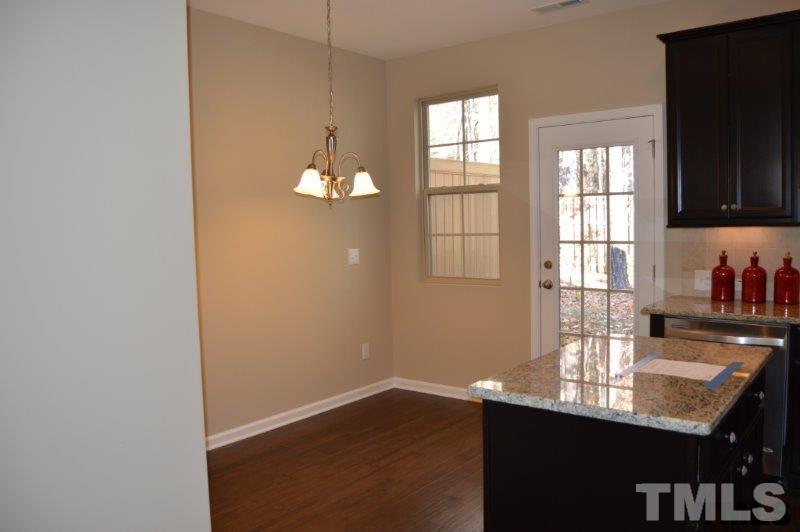 694 Wickham Ridge Road, Unit 139 Apex, NC 27539 - Photo 7 of 25 Granite Kitchen Island