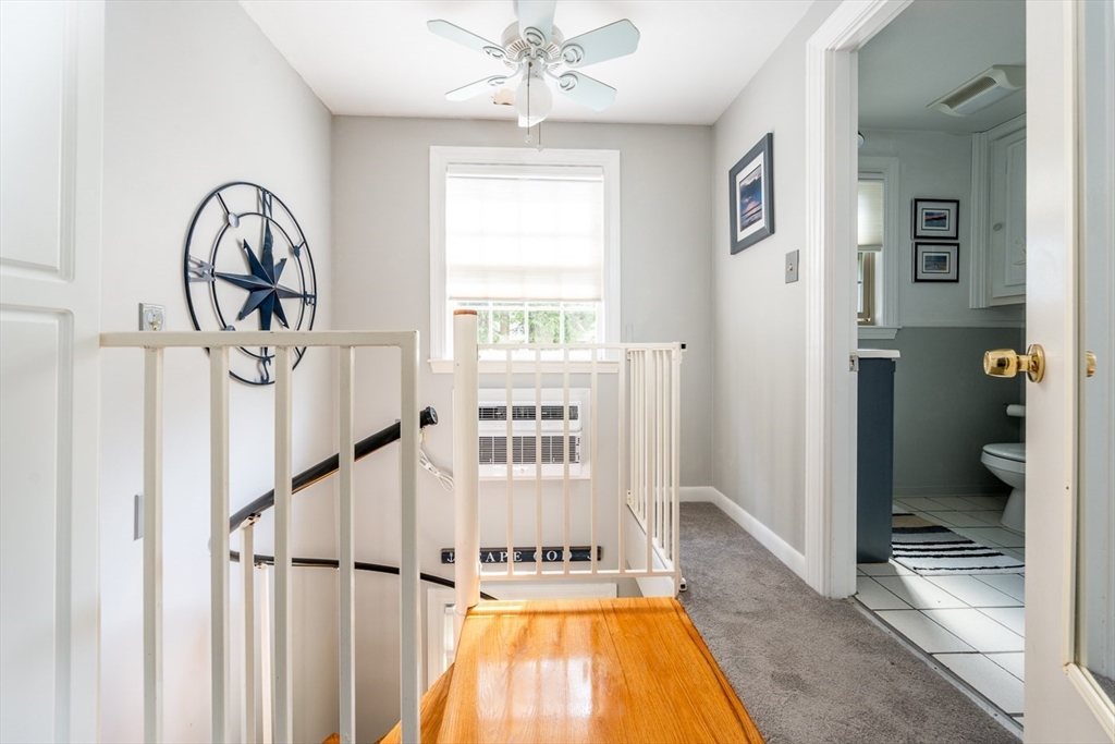 141 Main Street, Unit TH1 Dennis, MA 02660 - Photo 12 of 27 a view of a swimming pool with furniture and a window